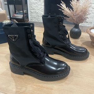 Absolutely gorgeous black combat boot. Brand new size 9. Prada